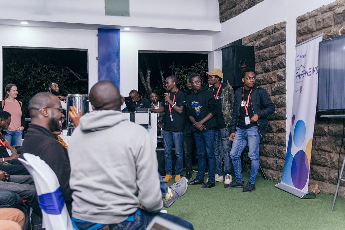 Image showing my team and I (rodneyosodo) doing a presentation