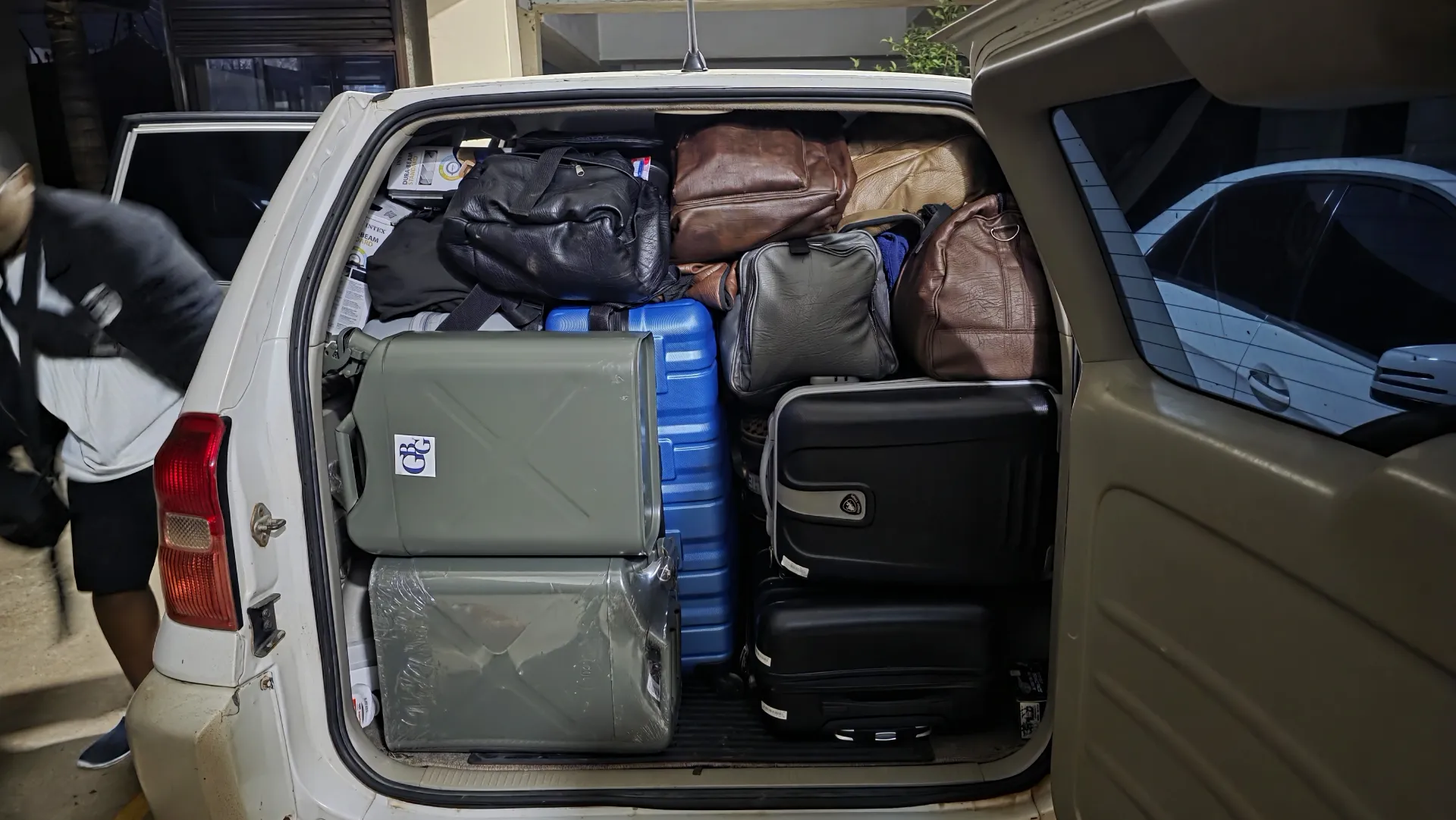 The car boot packed to the brim with our luggage