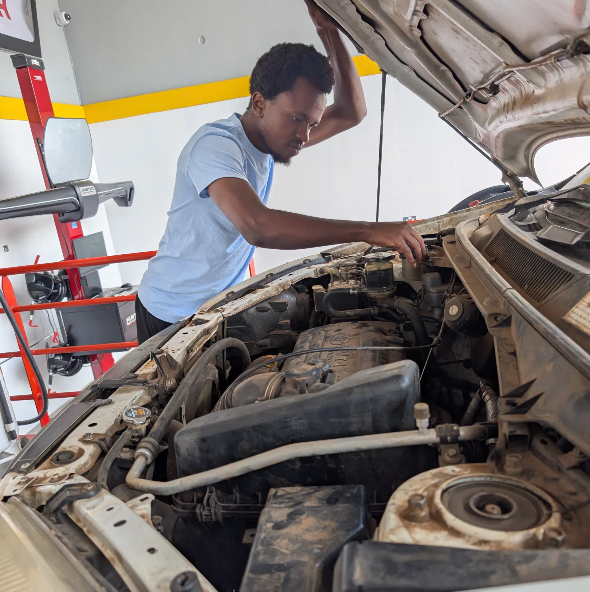 Michael inspecting the engine
