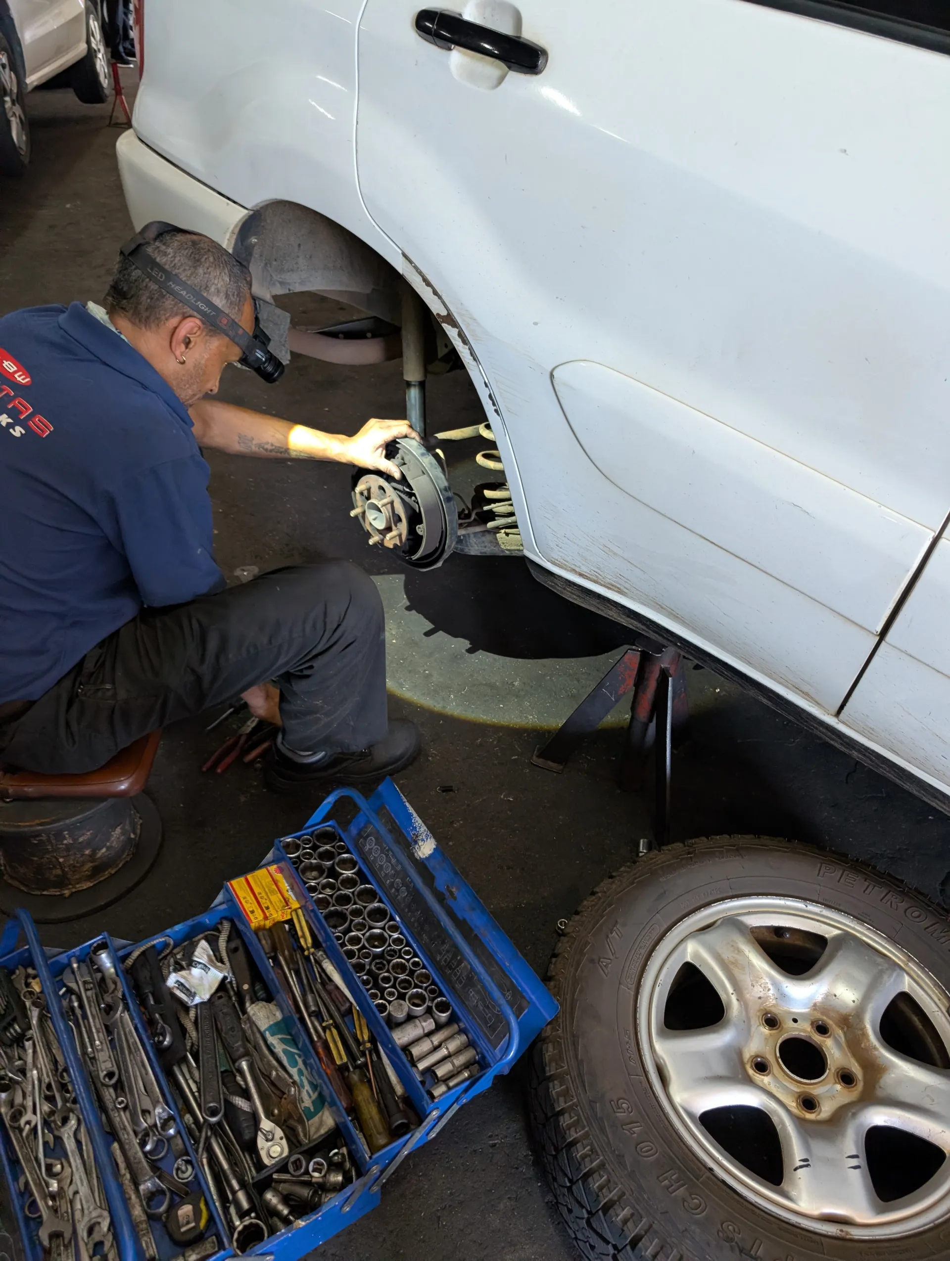 Our car rear brakes being repaired