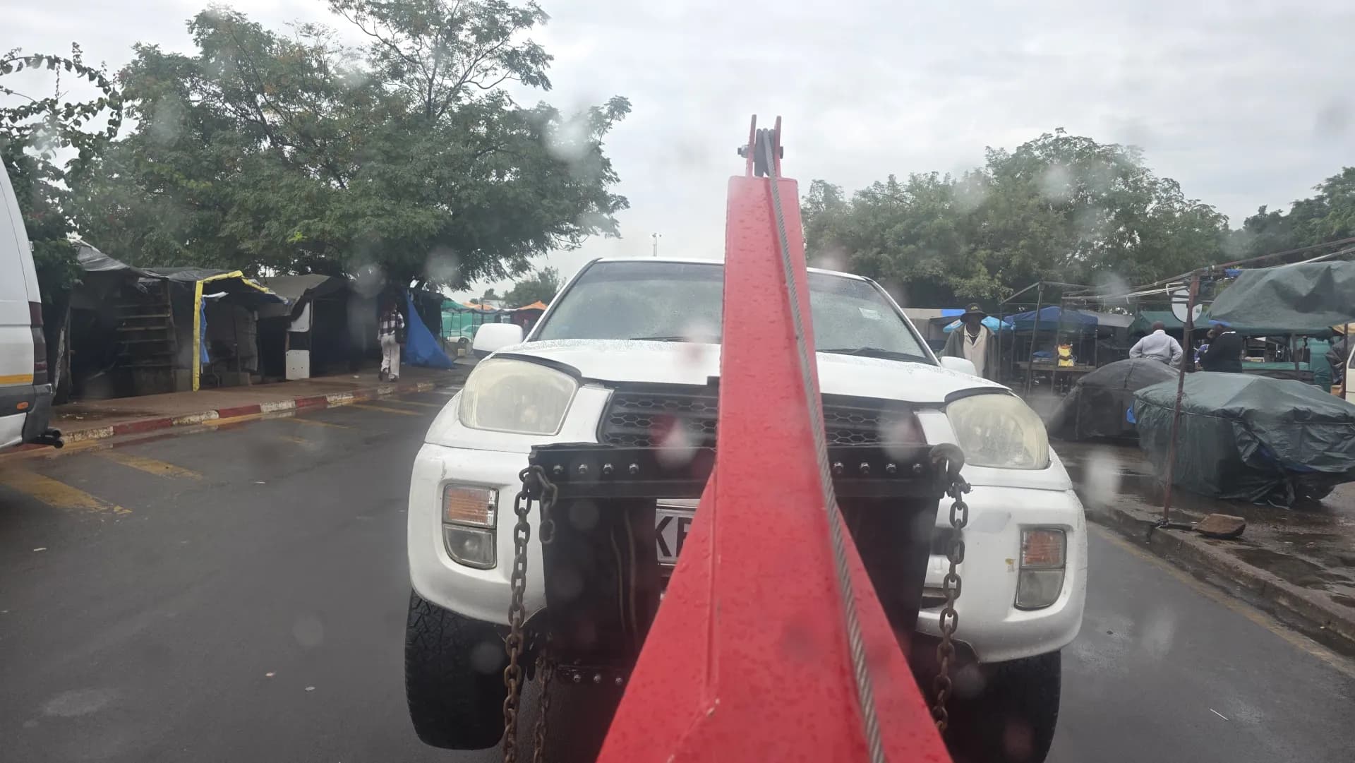 Car being towed to Uncle's Joe Motor Clinic Botswana